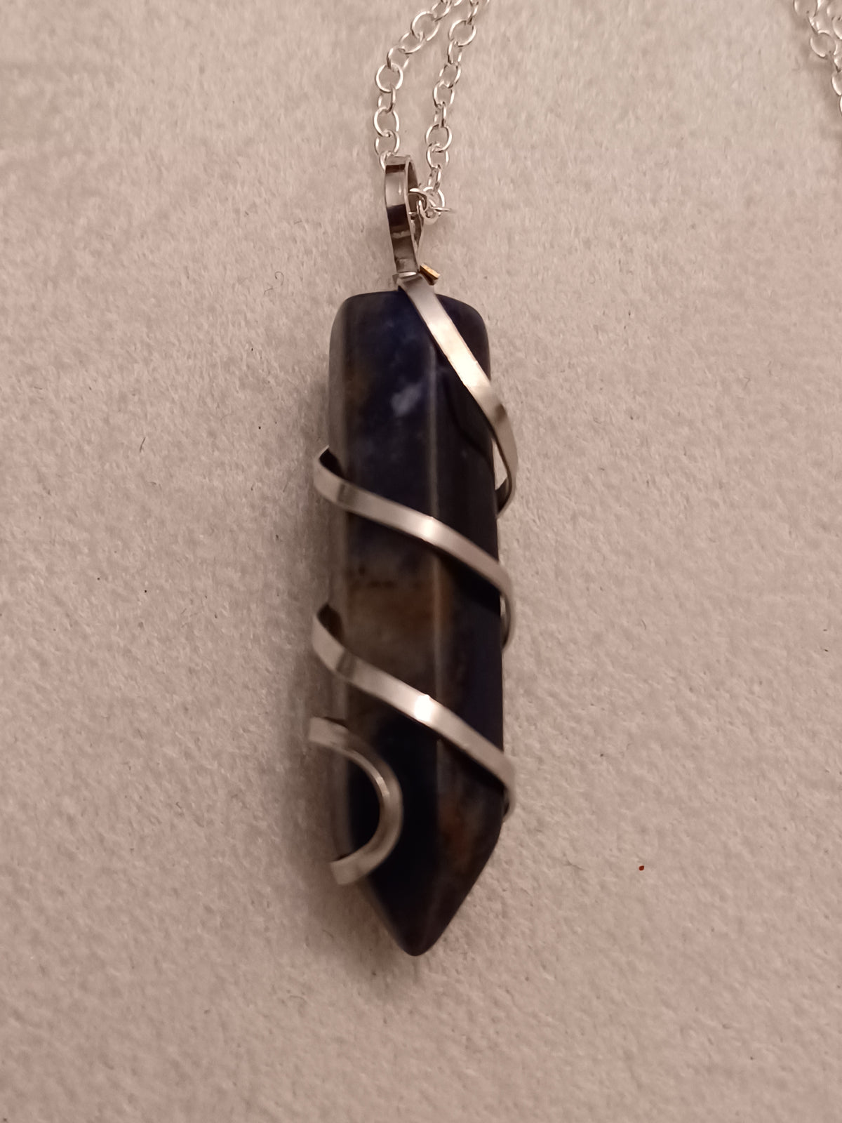 Sunset Sodalite Bullet Silver Wrapped Necklace