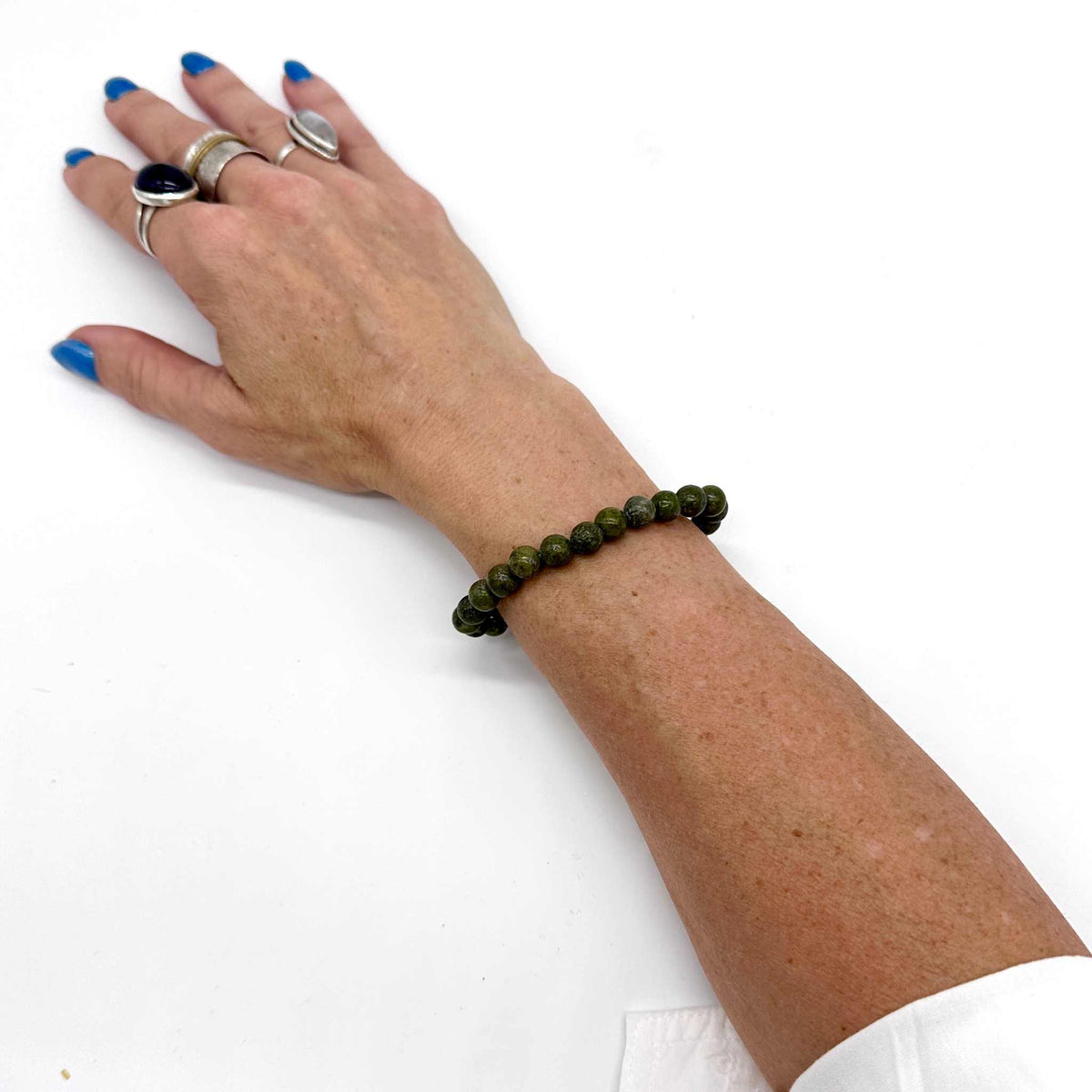 Epidote with Trace Pyrite Round Bead Bracelet – Focused Growth